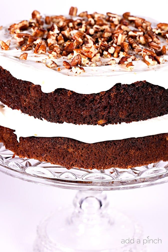 Favorite Carrot Cake Recipe - Carrot Cake makes for a flavorful and delicious dessert! Made with grated carrots and other mix-ins, this is my favorite carrot cake recipe of all time! // addapinch.com