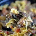 Cheesy Mushroom Sausage Pasta Recipe - This cheesy mushroom sausage pasta skillet makes a delicious, quick meal. Made with portobello mushrooms, sausage, pasta, and lots of cheese, this one skillet pasta recipe is a people pleaser! // addapinch.com
