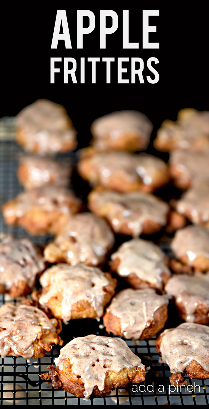 Apple fritters on sheet to cool  // addapinch.com