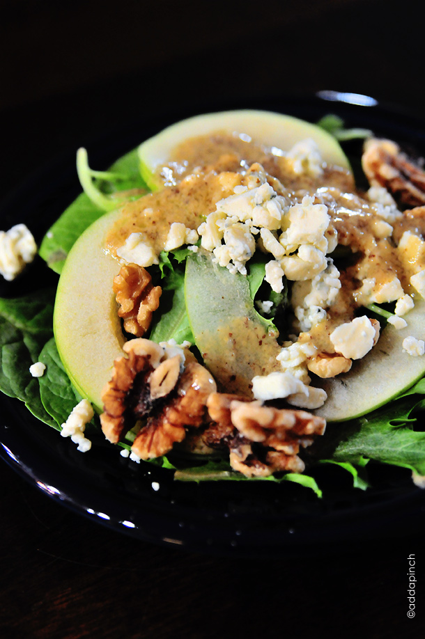 Apple Walnut Salad is a delicious blend of spinach, tart juicy apples, walnuts and creamy bleu cheese crumbles. It is simply perfect for fall. // addapinch.com