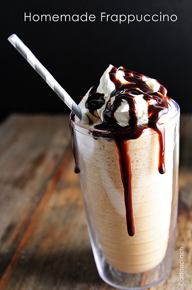 Glass of Frappuccino topped with whipped cream and chocolate. 