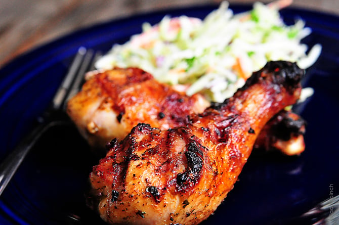 Grilled chicken legs with slaw on a blue plate // addapinch.com