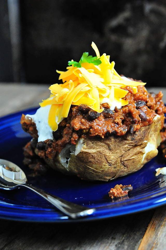 Chili Stuffed Baked Potatoes | addapinch.com