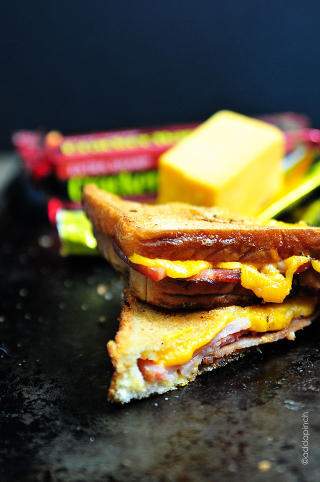 Grilled Cheese with Ham and Bacon Sandwich Recipe | addapinch.com