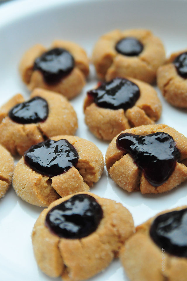 Peanut Butter and Jelly Thumbprint Cookies Recipe | addapinch.com