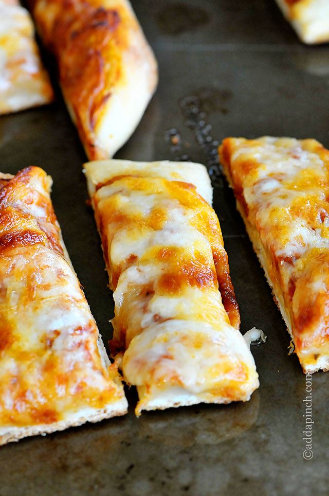 Cheesy Pizza Sticks | ©addapinch.com