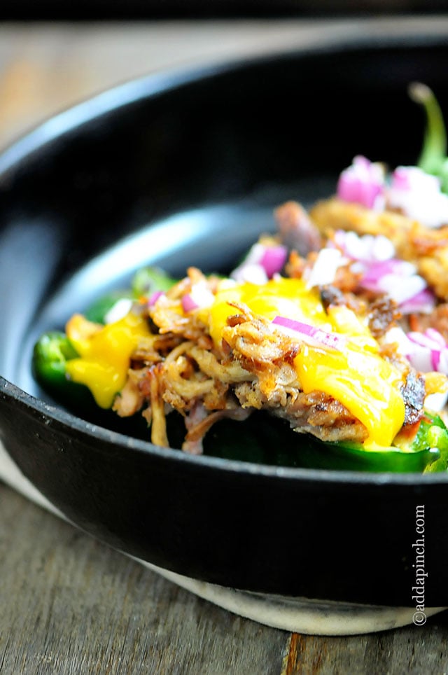 Pulled Pork Stuffed Poblano Peppers | ©addapinch.com