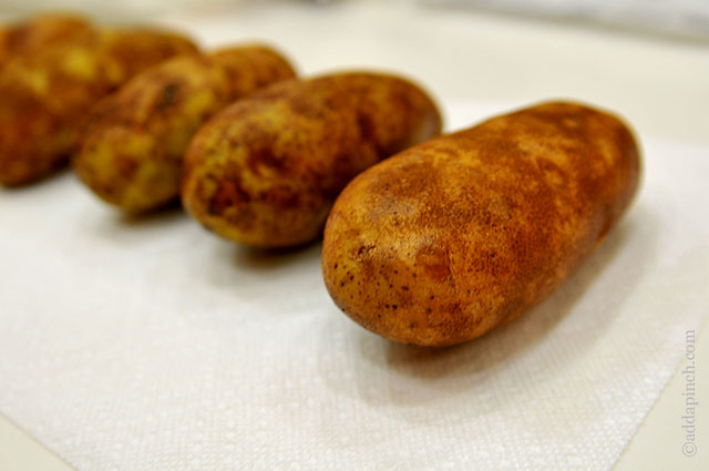 Slow Cooker Baked Potatoes | ©addapinch.com