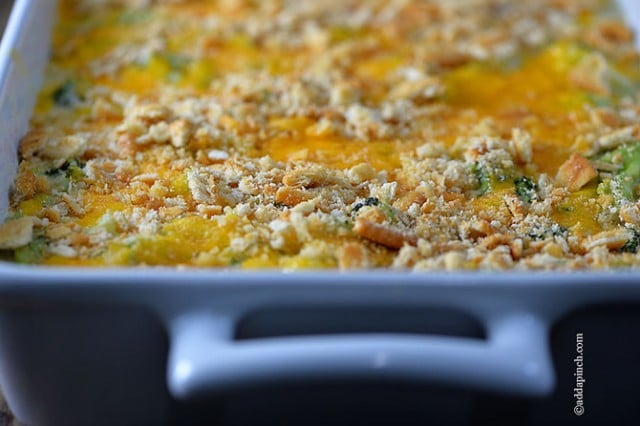 Broccoli Cheese Casserole in white dish with handles - addapinch.com