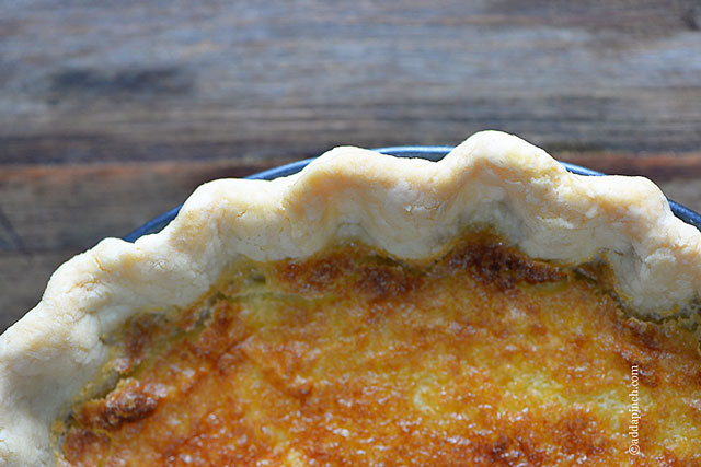 Overhead photo of pie on a wooden table. 