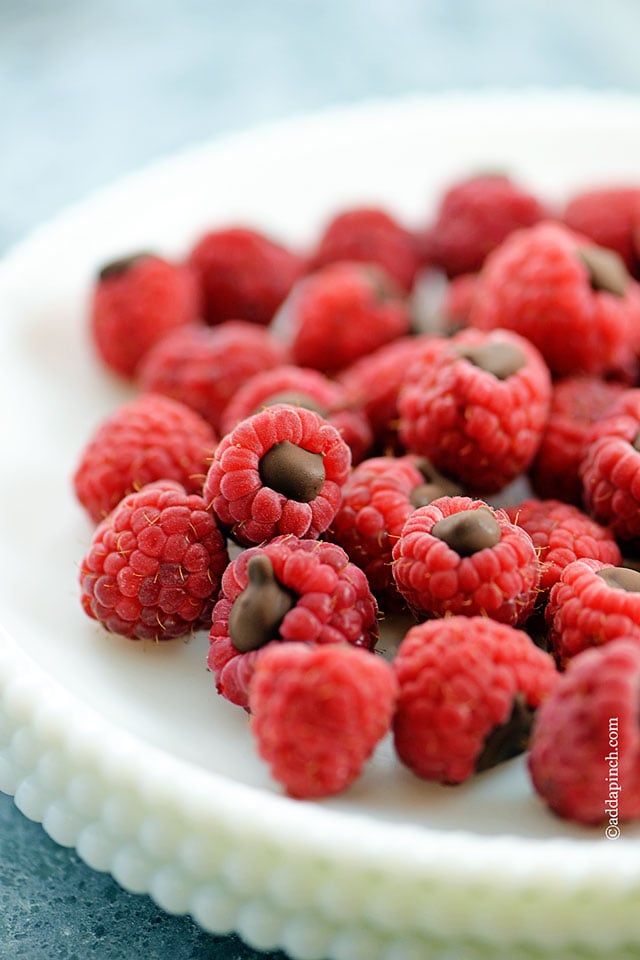 Chocolate Filled Raspberries on a white serving dish