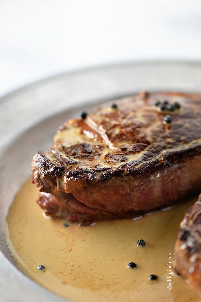 Steaks with Peppercorn Sauce Recipe | ©addapinch.com