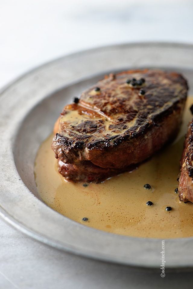 Steaks with Peppercorn Sauce Recipe | ©addapinch.com