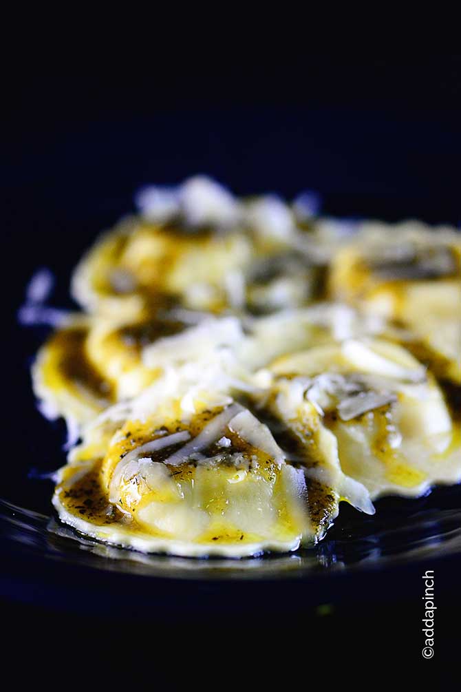 Ravioli with Pesto Sauce Recipe from addapinch.com