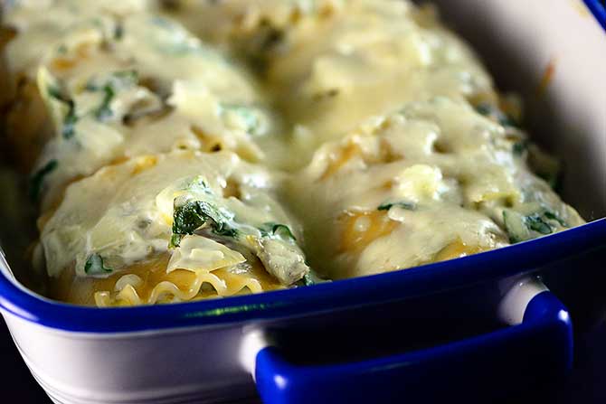 Spinach Artichoke Lasagna Rolls Recipe from addapinch.com