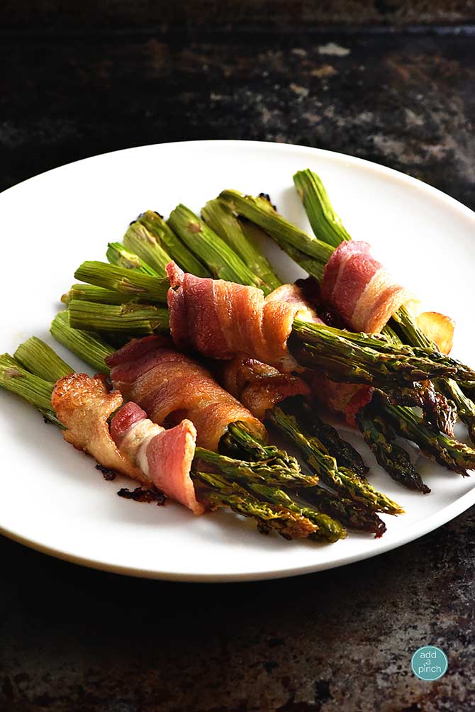 Bacon Wrapped Asparagus Recipe from addapinch.com