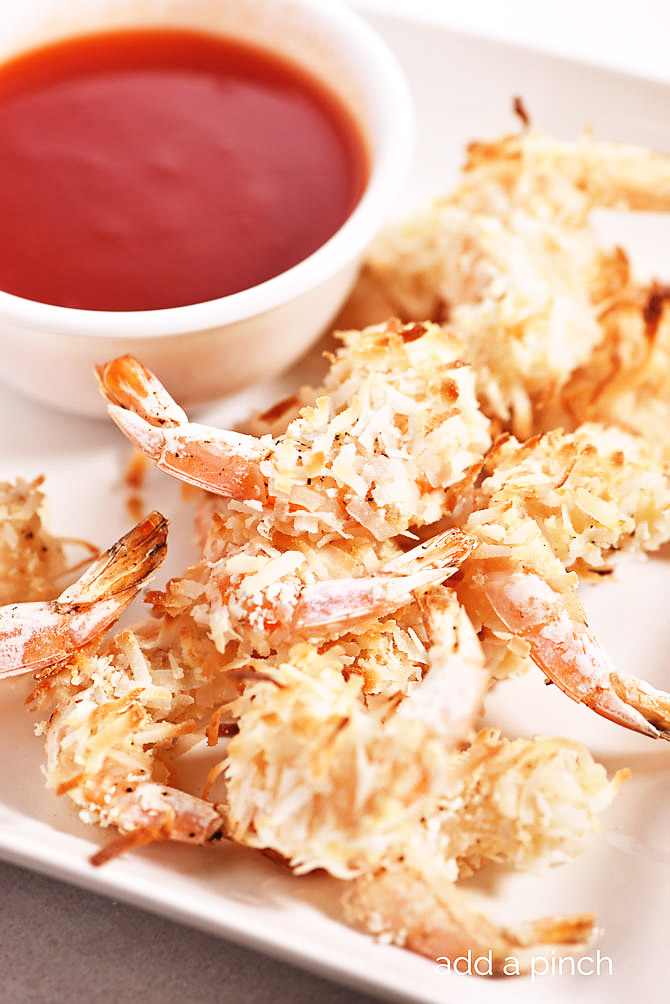 Baked Coconut Shrimp - Coconut shrimp is always a restaurant favorite, but this simple recipe couldn't be easier for delicious baked coconut shrimp at home! // addapinch.com