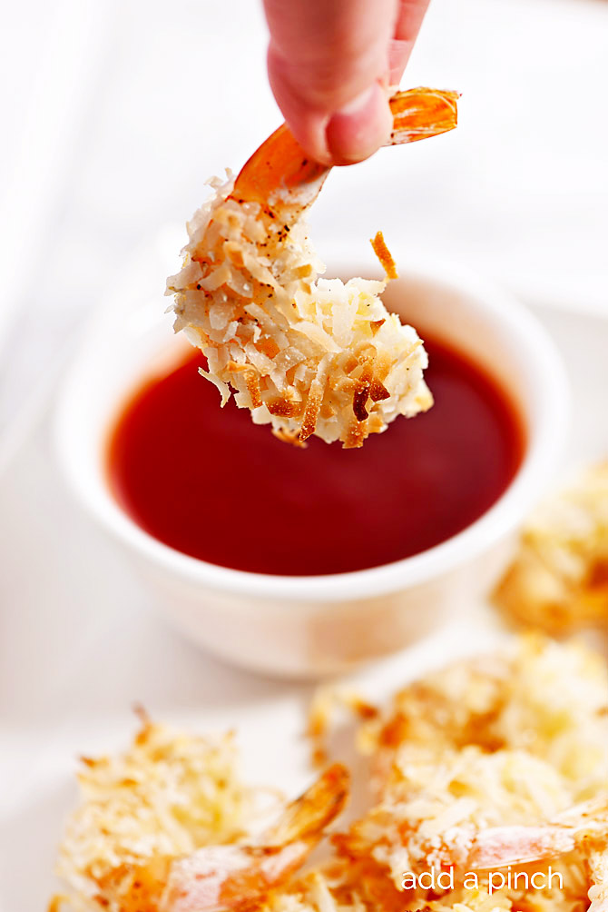 Baked Coconut Shrimp - Coconut shrimp is always a restaurant favorite, but this simple recipe couldn't be easier for delicious baked coconut shrimp at home! // addapinch.com