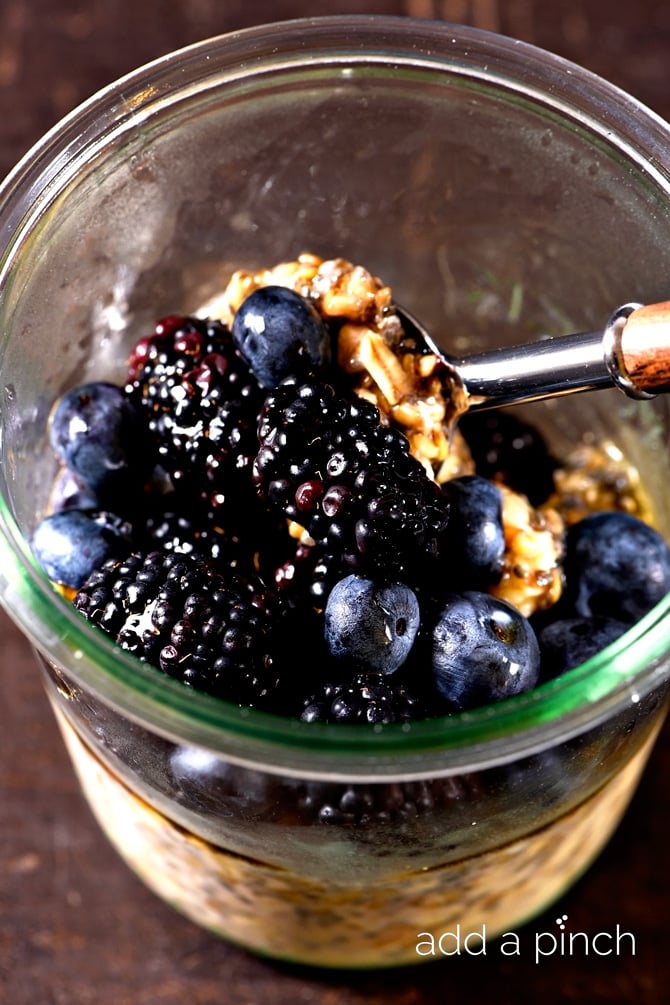 This maple berry overnight oats recipe is a busy family's friend! Perfect for those rushed mornings or for a grab and go breakfast! // addapinch.com