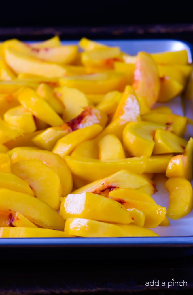How to Freeze Fresh Peaches in a few simple steps preserves that summer freshness for later use! // addapinch.com