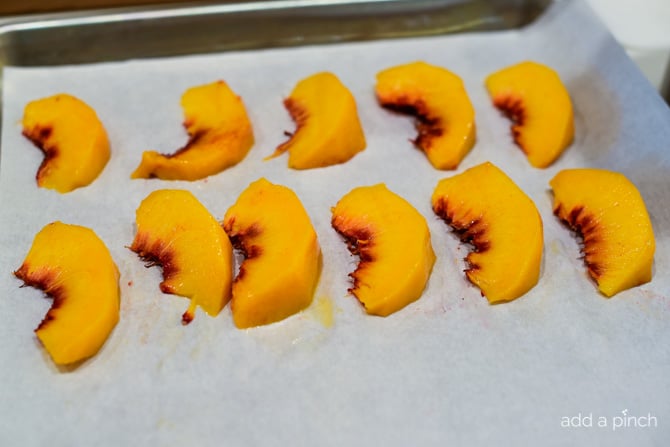 Learning how to freeze fresh peaches preserves that juicy summer peach for later use in just a few simple steps! // addapinch.com
