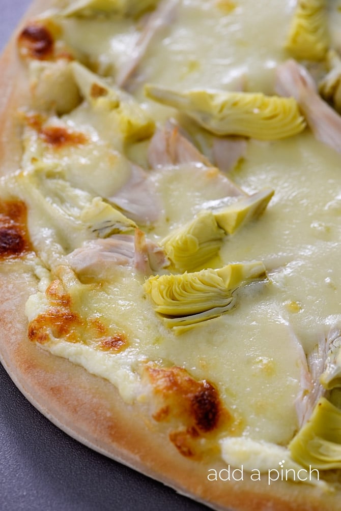 Chicken Artichoke Pizza makes one of the most delicious homemade pizzas! // addapinch.com 