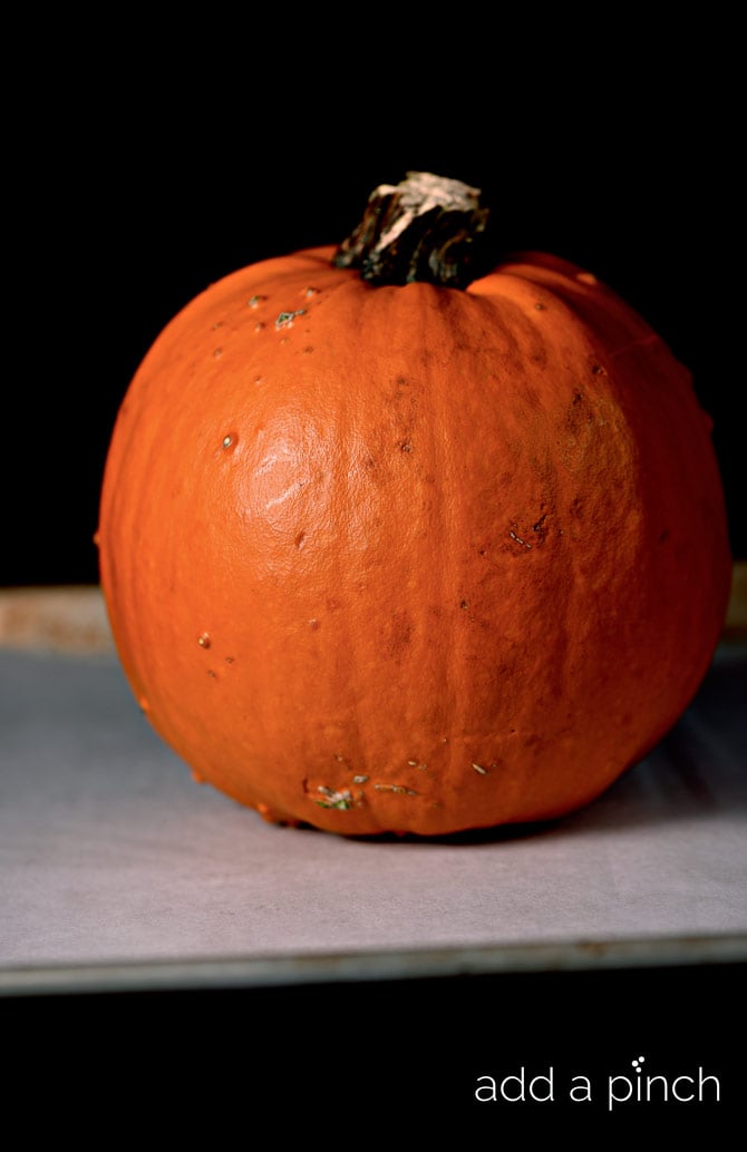 Homemade Pumpkin Puree is so simple to make at home and is absolutely scrumptious! // addapinch.com