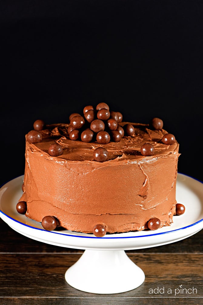 This Malted Chocolate Cake makes a "whopper" chocolate cake recipe perfect for celebrating all sort of occasions - or just because! // addapinch.com