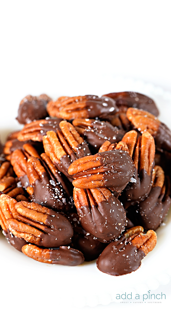 Chocolate Dipped Pecans make an easy, yet elegant treat perfect for entertaining and gifts! // addapinch.com