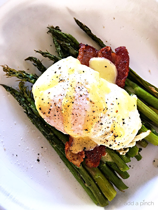 Eggs Benedict with Asparagus Recipe - This Eggs Benedict with Asparagus makes a delicious recipe for breakfast, brunch or even a light supper! // addapinch.com