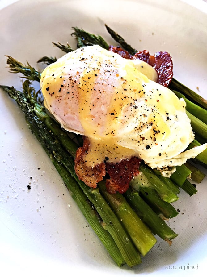 Eggs Benedict with Asparagus Recipe - This Eggs Benedict with Asparagus makes a delicious recipe for breakfast, brunch or even a light supper! // addapinch.com