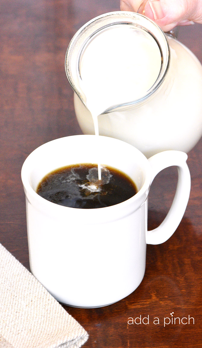 Homemade Coffee Creamer makes a quick, easy, and delicious treat for your coffee! Made with just four ingredients and ready in minutes! // addapinch.com