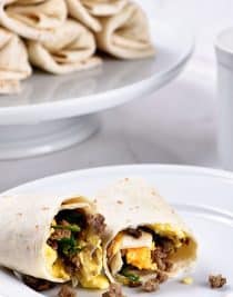 Make-Ahead Breakfast Burritos Recipe - Stock your freezer with these easy make-ahead breakfast burritos for even easier mornings! // addapinch.com