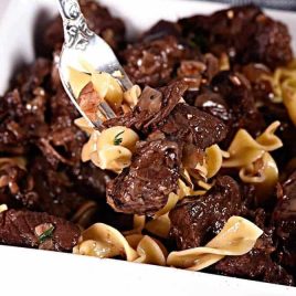 Beef Bourguignon Recipe - Beef Bourguignon makes a classic meal. This simple recipe for making beef bourguignon will quickly become a family-favorite. // addapinch.com