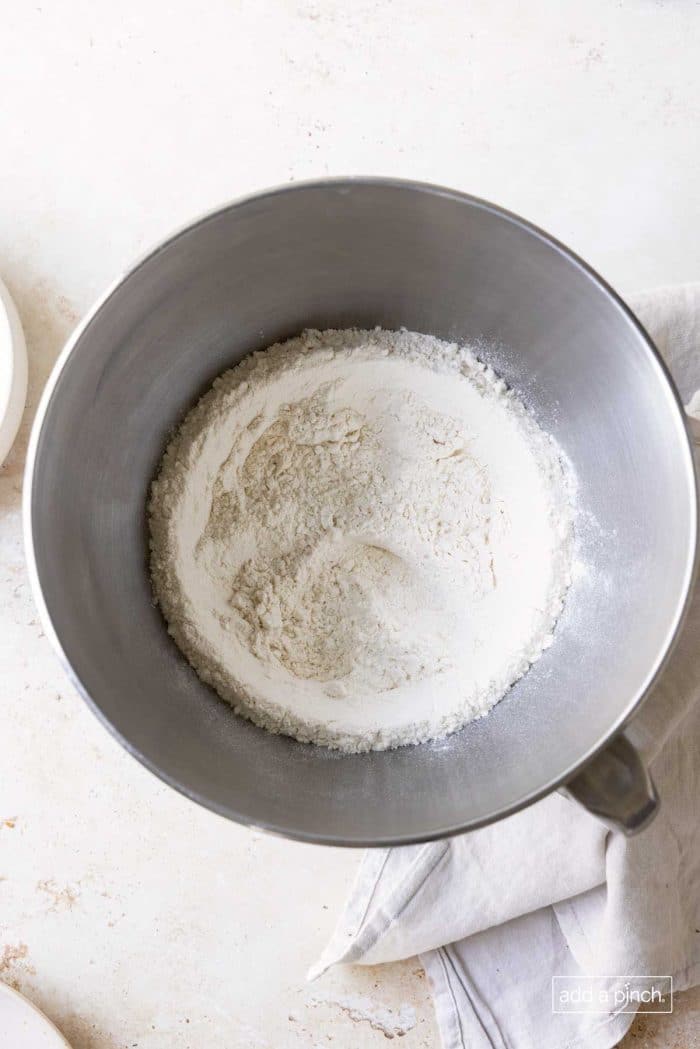 Flour and salt whisked together in a bowl.