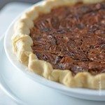 The BEST Pecan Pie Recipe - This Pecan Pie Recipe is a classic in my husband's family. For every family gathering, you better believe there will be pecan pie sitting front and center on the dessert table. Every. single. time. // addapinch.com