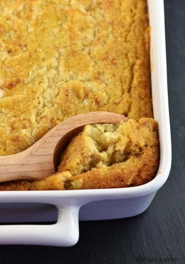 Southern Cornbread Dressing makes a comforting, classic dish for the holidays! Moist and delicious, cornbread dressing makes the perfect side dish! // addapinch.com