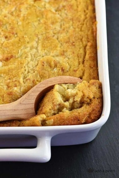 Southern Cornbread Dressing makes a comforting, classic dish for the holidays! Moist and delicious, cornbread dressing makes the perfect side dish! // addapinch.com