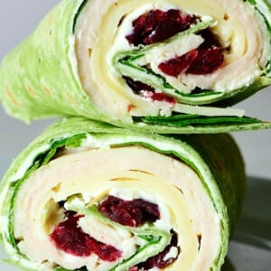 Turkey wrap with dried cranberries in a spinach wrap.