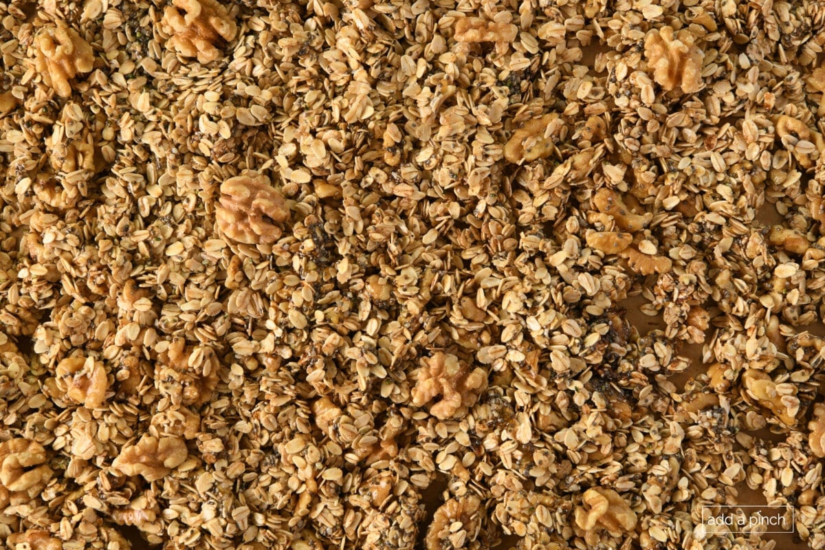 Granola ready to baked in sheet pan.