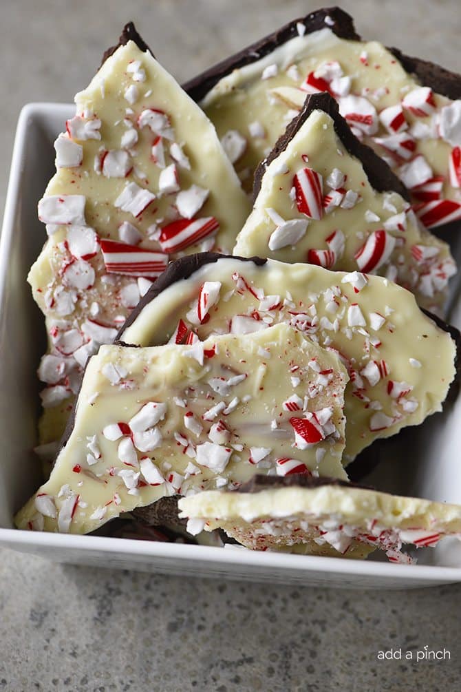 Peppermint Bark broken in pieces and stacked in serving dish. 