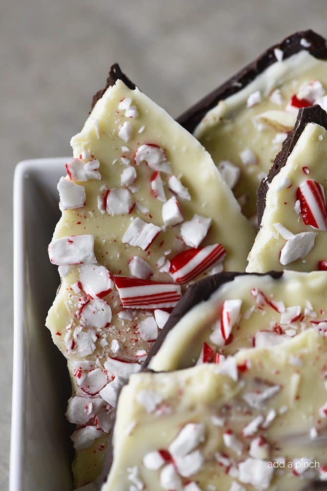 Peppermint Bark with layers of milk chocolate and white chocolate and topped with peppermint candy