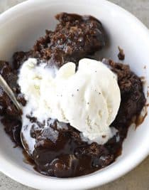 Southern Chocolate Cobbler Recipe - Chocolate Cobbler is a classic Southern dessert recipe. With a delicious brownie-like topping and a rich fudge sauce on the bottom, this Chocolate Cobbler is like a lava cake but so much easier to make. Great for reunions, potlucks, and more! // addapinch.com