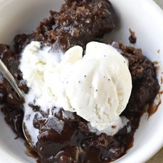 Southern Chocolate Cobbler Recipe - Chocolate Cobbler is a classic Southern dessert recipe. With a delicious brownie-like topping and a rich fudge sauce on the bottom, this Chocolate Cobbler is like a lava cake but so much easier to make. Great for reunions, potlucks, and more! // addapinch.com
