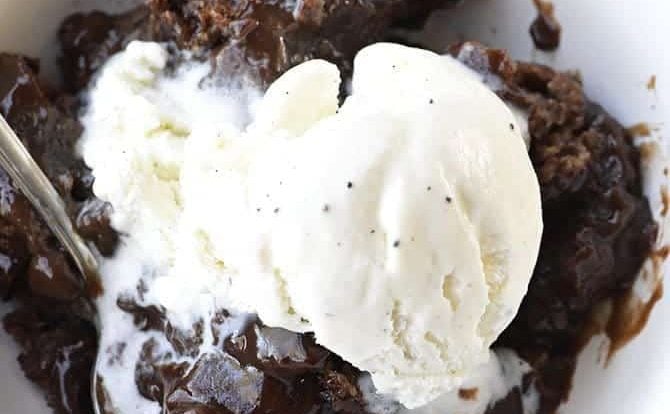 Southern Chocolate Cobbler Recipe - Chocolate Cobbler is a classic Southern dessert recipe. With a delicious brownie-like topping and a rich fudge sauce on the bottom, this Chocolate Cobbler is like a lava cake but so much easier to make. Great for reunions, potlucks, and more! // addapinch.com