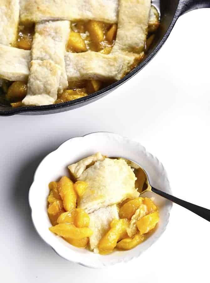 Old Fashioned Southern Peach Cobbler Recipe - Peach Cobbler Recipe – My Grandmother’s peach cobbler recipe is a traditional Southern peach cobbler! This heirloom recipe makes the best peach cobbler that has always been a staple in my family for generations. // addapinch.com