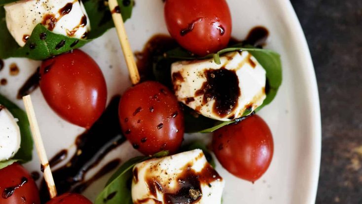 Caprese Salad Skewers Recipe - Caprese Salad Skewers make a delicious appetizer to serve when entertaining. Fresh and easy, these caprese salad skewers will become a go-to favorite! // addapinch.com