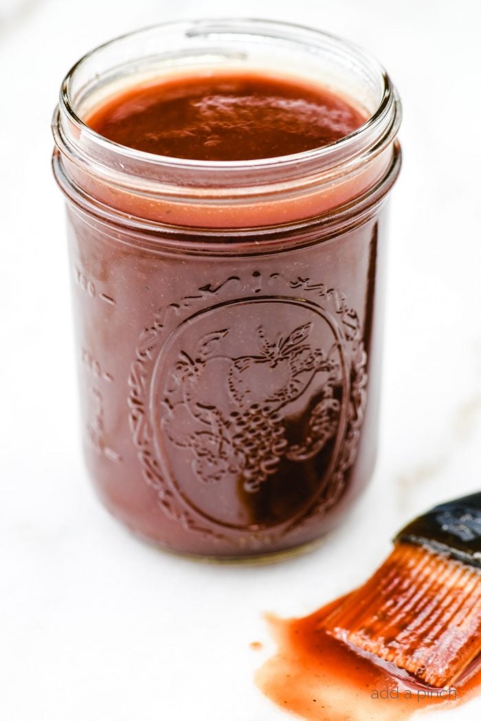 This family Coca-Cola BBQ Sauce recipe is an all-time favorite. Sweet, spicy, and oh so delicious, this bbq sauce recipe is a must in my family. // addapinch.com