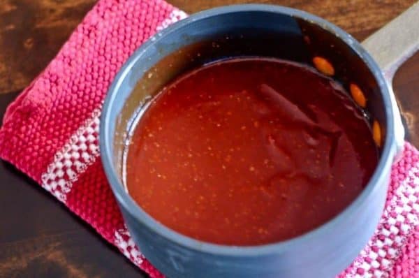 Mama's Coca Cola BBQ Sauce - This family Coca-Cola BBQ Sauce recipe is an all-time favorite. Sweet, spicy, and oh so delicious, this bbq sauce recipe is a must in my family. // addapinch.com