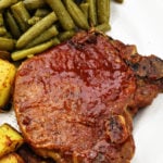 Slow Cooker BBQ Pork Chops - The slow cooker makes these pork chops fork tender and a family favorite! Just 5 minutes of prep time make this a favorite weeknight meal! // addapinch.com